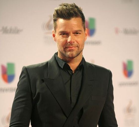 <p>The Puerto Rican-born superstar started his career in the teen boy band Menudo, but it wasn't long before he became a worldwide sensation with hits such as <em>Living La Vida Loca</em> and <em>She Bangs</em>. While Martin kept his sexuality under wraps for a while, he came out as a proud gay man in 2010. "I am proud to say that I am a fortunate homosexual man. I am very blessed to be who I am." He can now be seen all over town with his boyfriend Carlos Gonzalez and their two adorable sons Matteo and Valentino. <br /><br /></p>